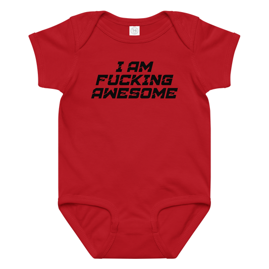 "I Am Fucking Awesome" printed on a red baby jersey bodysuit laying on a flat surface amongst other clothes
