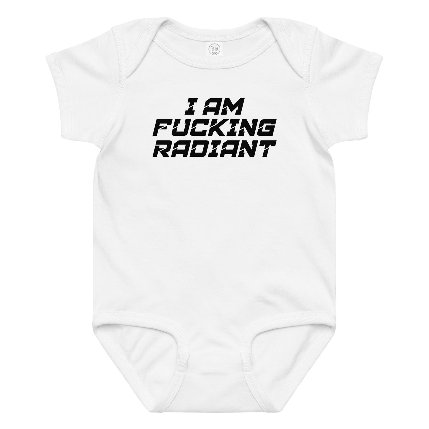 "I Am Fucking Radiant" printed on a white baby jersey bodysuit laying on a flat surface amongst other clothes