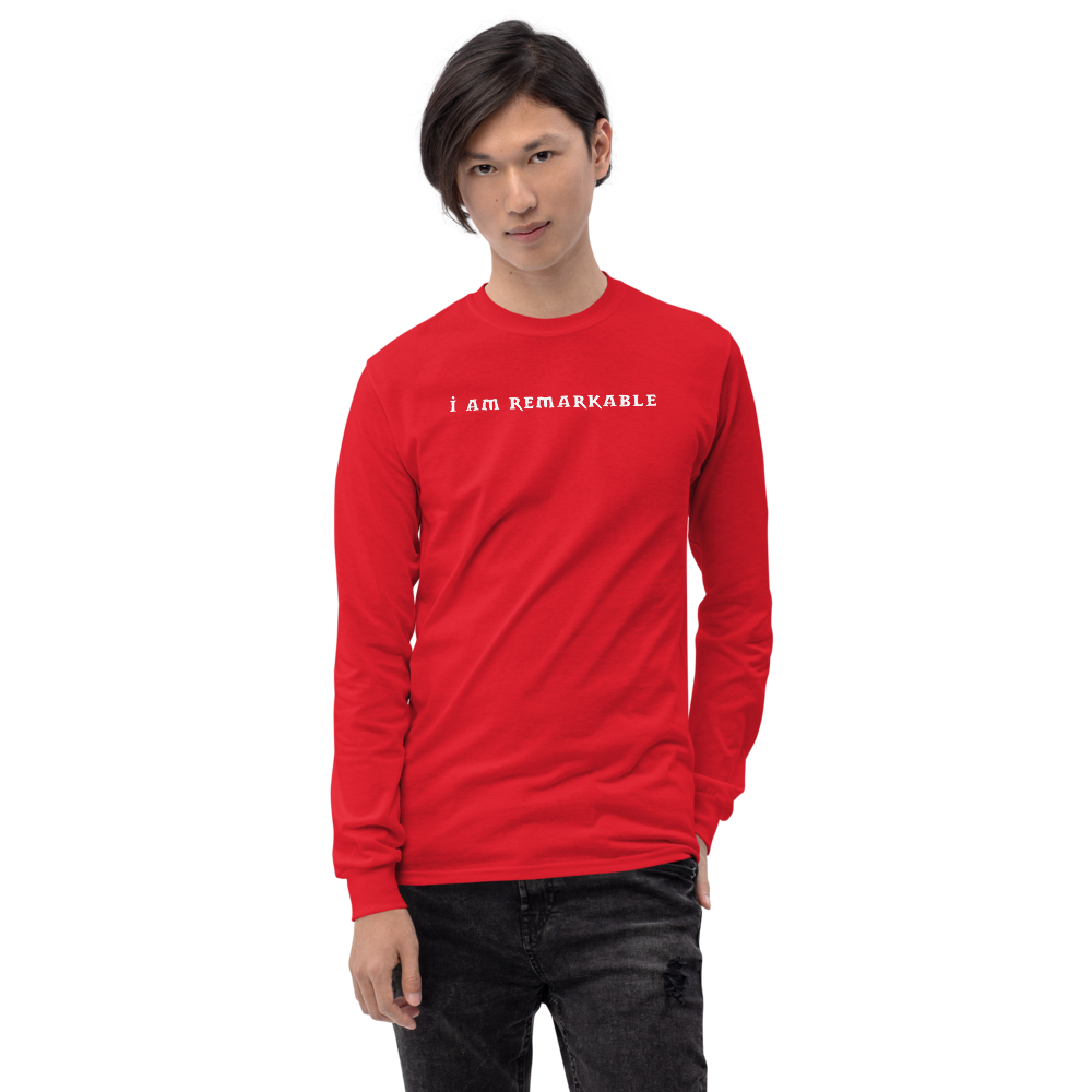 "I am remarkable" printed on a red men's long sleeve shirt worn by a male