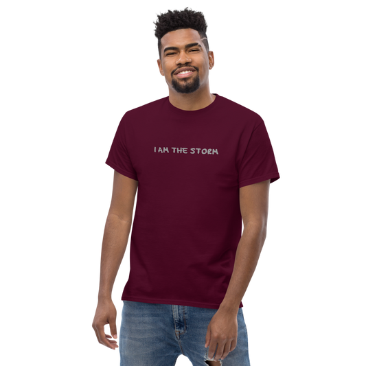"I am the storm" printed on a maroon unisex classic tee worn by a male