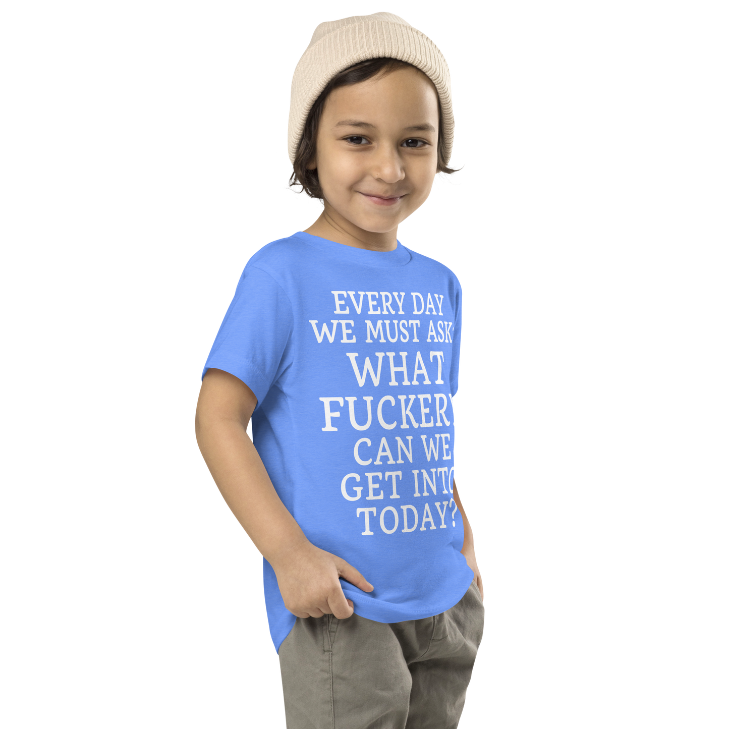 "Every day we must ask: What fuckery can we get into today?" printed on a heather columbia blue toddler short sleeve tee worn by a male who is also wearing a knit cap