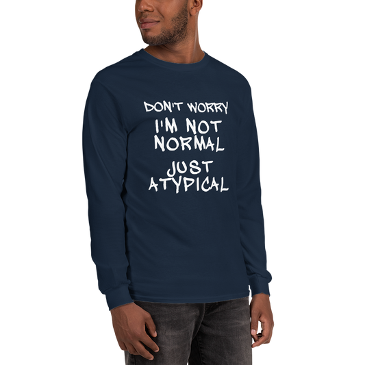 "Don't Worry I'm Not Normal Just Atypical" printed on a navy men's long sleeve shirt worn by a male
