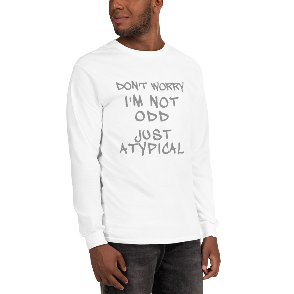 "Don't Worry I'm Not Odd Just Atypical" printed on a white men's long sleeve shirt worn by a male