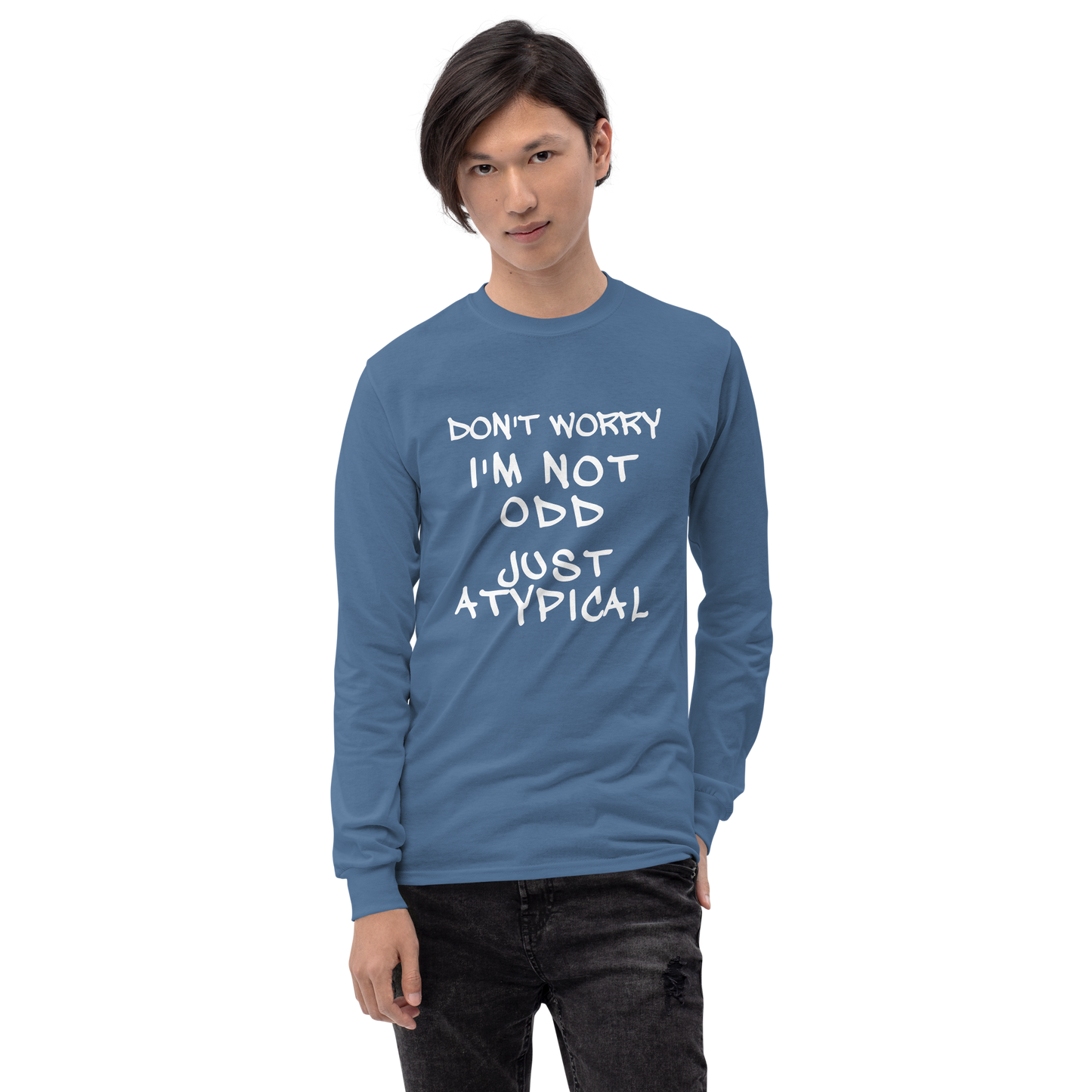 "Don't Worry I'm Not Odd Just Atypical" printed on a indigo blue men's long sleeve shirt worn by a male