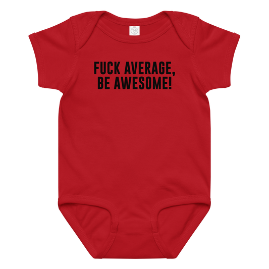 "Fuck Average, Be Awesome!" printed on a red baby jersey bodysuit laying on a flat surface amongst other clothes