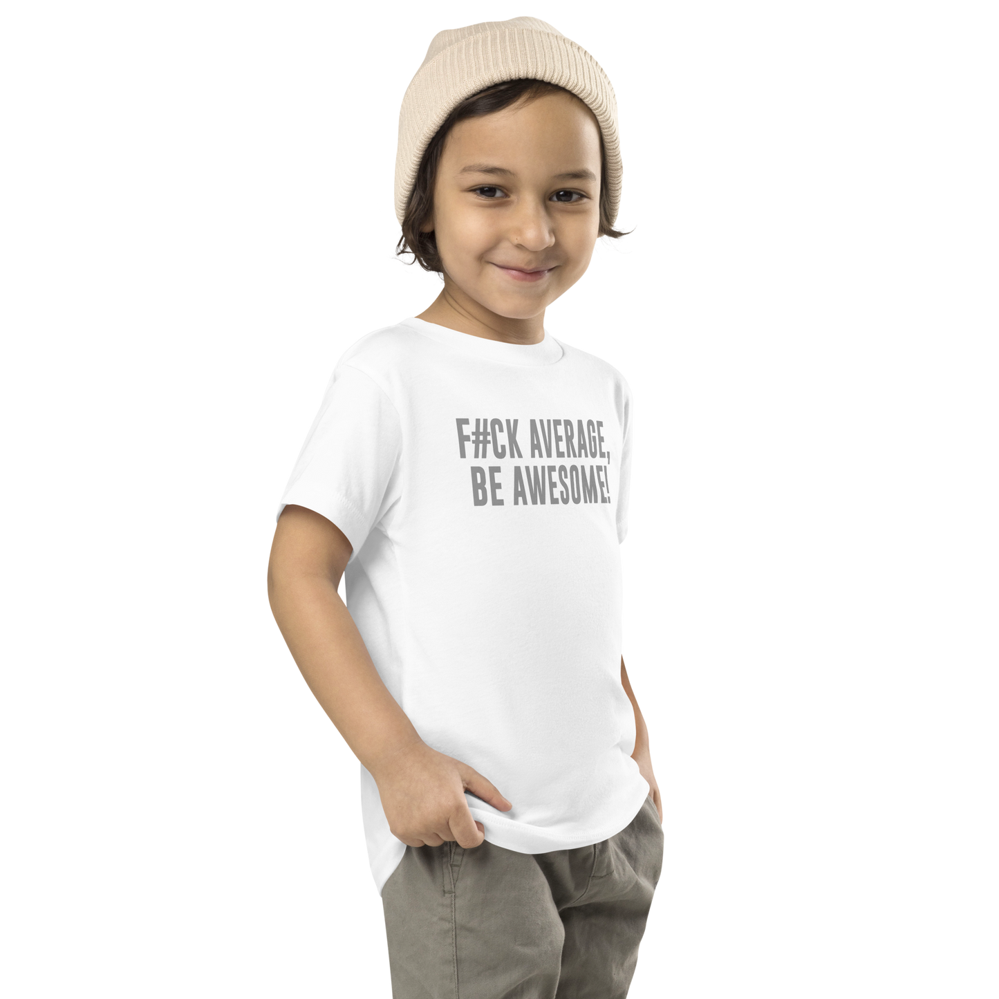 "F#Ck Average, Be Awesome!" printed on a white toddler short sleeve tee worn by a male who is also wearing a knit cap