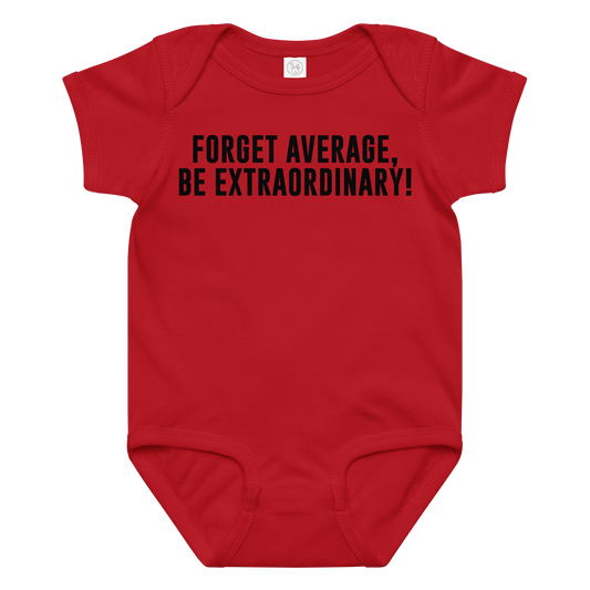 "Forget Average, Be Extraordinary!" printed on a red baby jersey bodysuit laying on a flat surface amongst other clothes