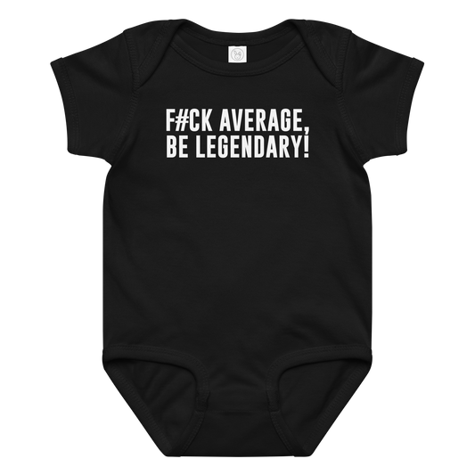 "F#Ck Average, Be Legendary!" printed on a black baby jersey bodysuit laying on a flat surface amongst other clothes