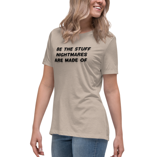 "Be the stuff nightmares are made of" printed on a heather stone women's relaxed t-shirt worn by a female