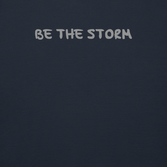 "Be the storm" printed on a navy blazer background