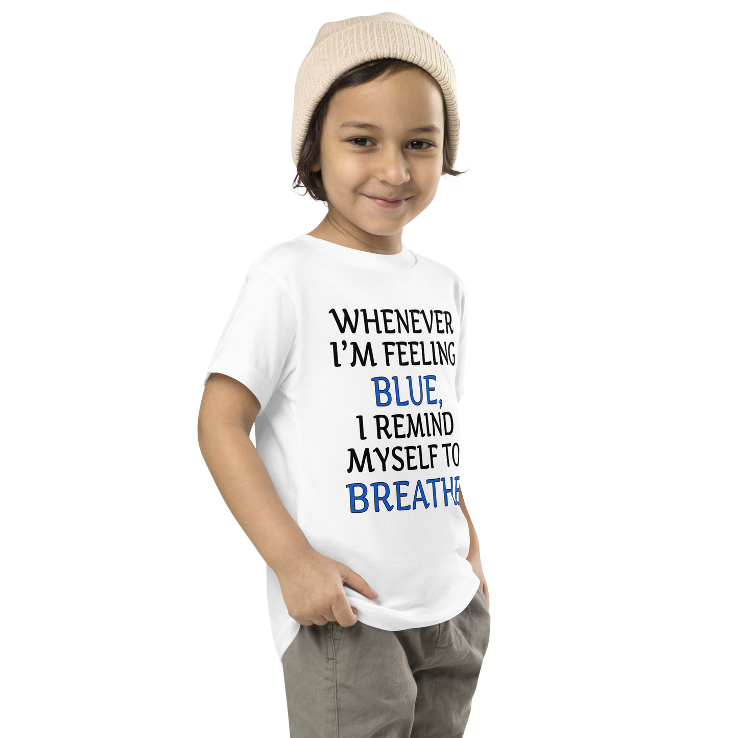 "Whenever I'm feeling blue, I remind myself to breathe" printed on a white toddler short sleeve tee worn by a male who is also wearing a knit cap
