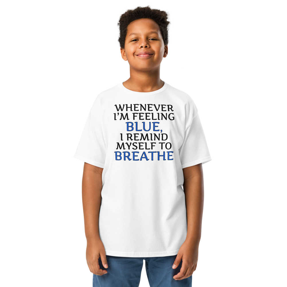 "Whenever I'm feeling blue, I remind myself to breathe" printed on a white youth classic tee worn by a male