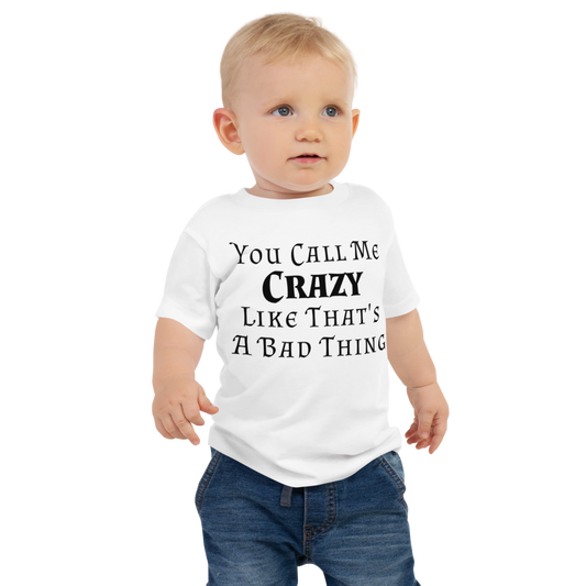 "You Call Me Crazy Like That's A Bad Thing" printed on a white baby jersey short sleeve tee worn by a male