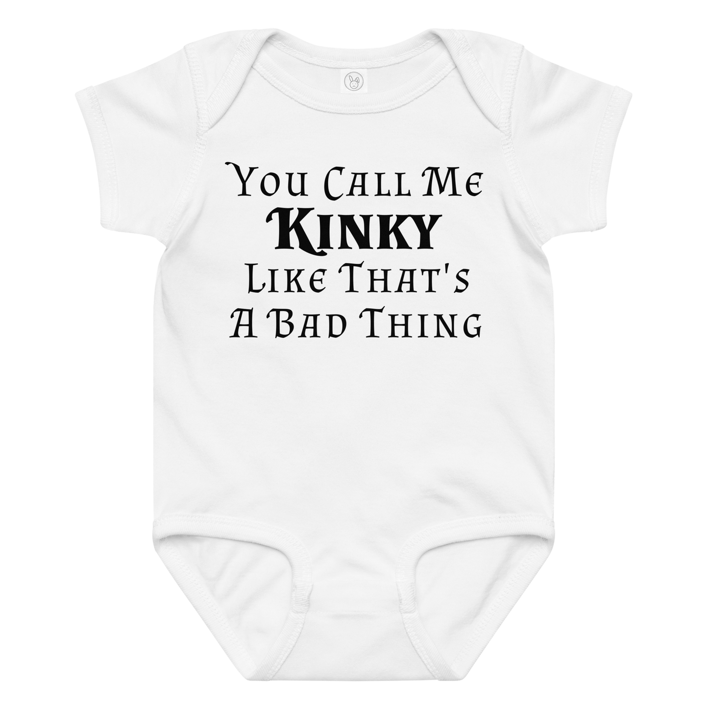 "You Call Me Kinky Like That's A Bad Thing" printed on a white baby jersey bodysuit laying on a flat surface amongst other clothes