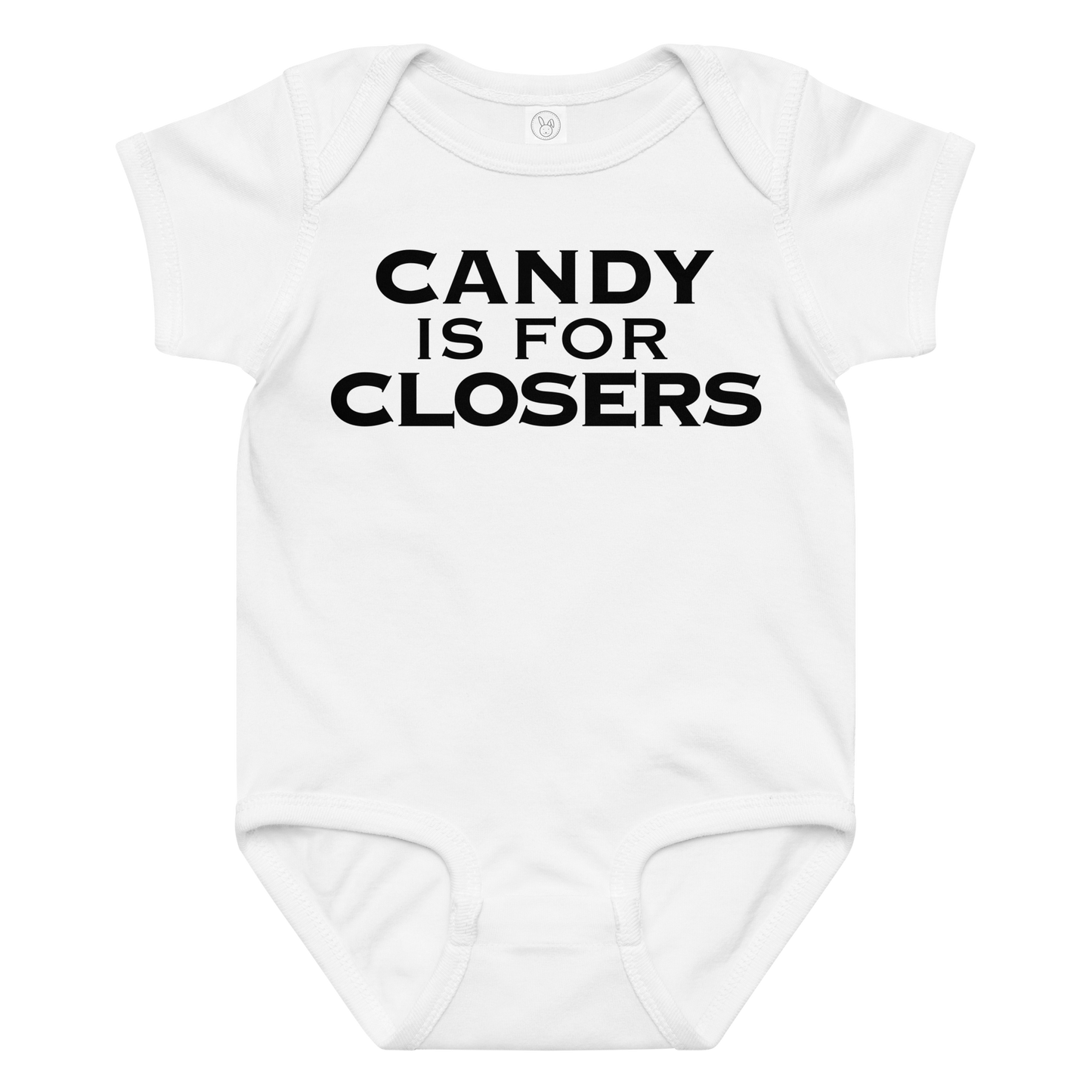 "Candy Is For Closers" printed on a white baby jersey bodysuit laying on a flat surface amongst other clothes