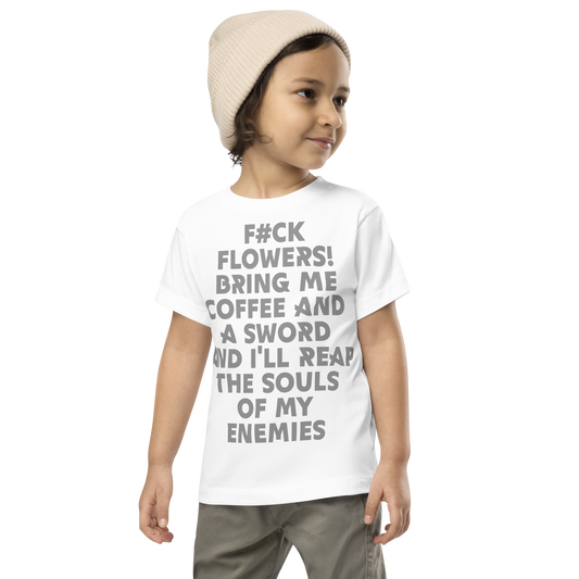 "F#Ck Flowers! Bring Me Coffee And A Sword And I'll Reap The Souls Of My Enemies" printed on a white toddler short sleeve tee worn by a male wearing a cap