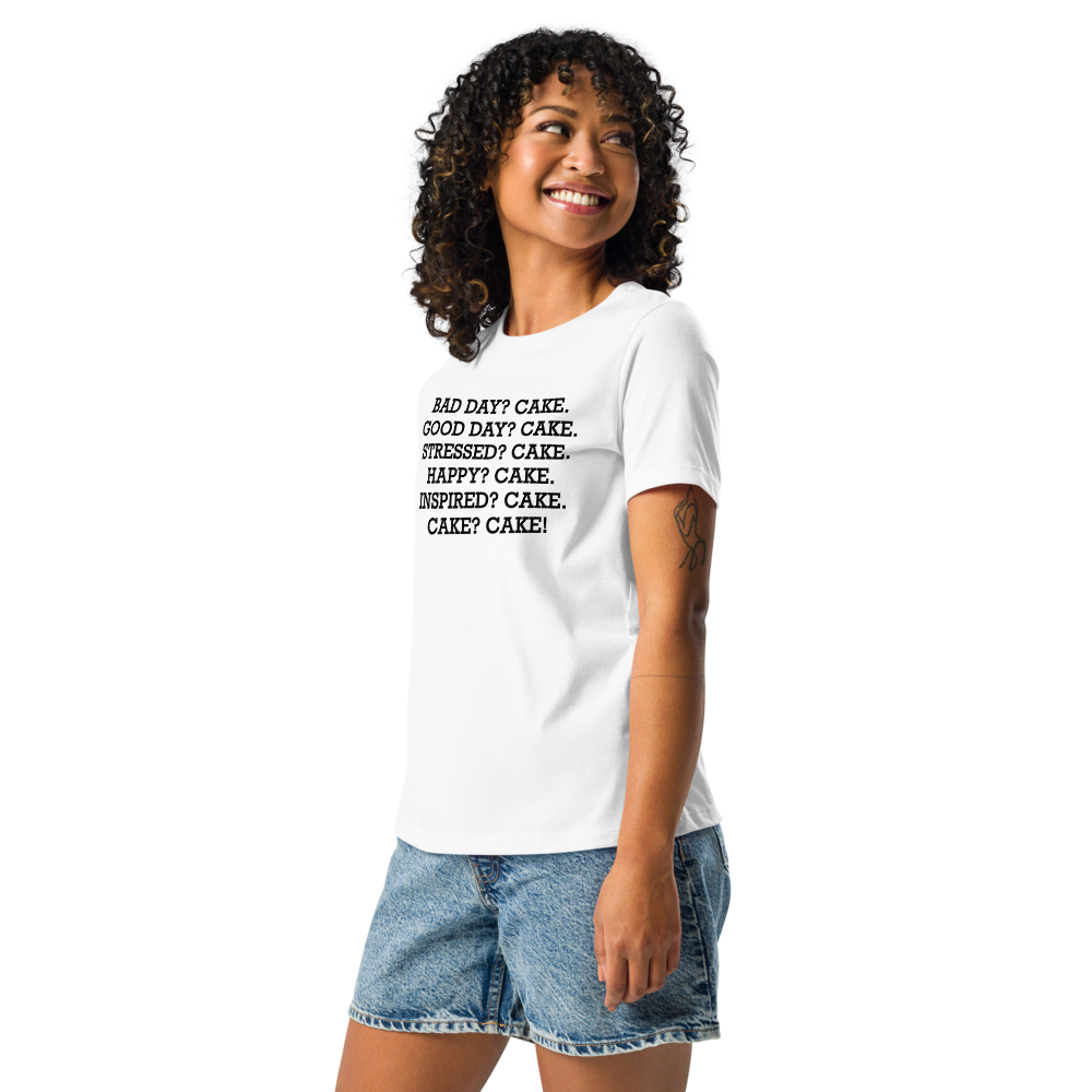 "Bad Day? Cake. Good Day? Cake. Stressed? Cake. Happy? Cake. Inspired? Cake. Cake? Cake!" printed on a white women's relaxed t-shirt worn by a female