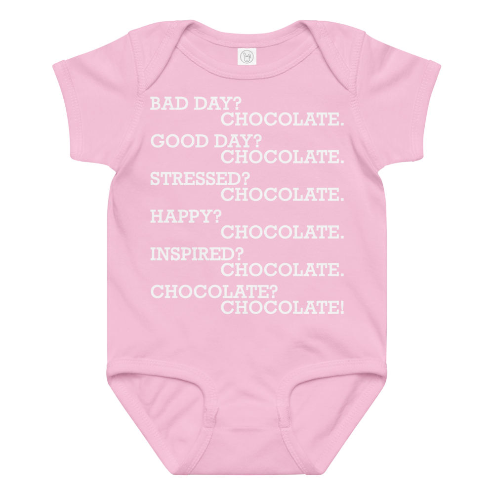 "Bad Day? Chocolate. Good Day? Chocolate. Stressed? Chocolate. Happy? Chocolate. Inspired? Chocolate. Chocolate? Chocolate!" printed on a pink baby jersey bodysuit laying on a flat surface amongst other clothes