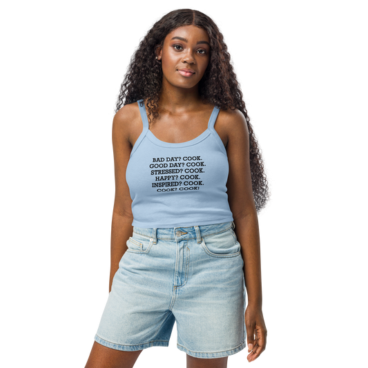 "Bad Day? Cook. Good Day? Cook. Stressed? Cook. Happy? Cook. Inspired? Cook. Cook? Cook!" printed on a solid baby blue blend women's micro-rib tanktop worn by a female