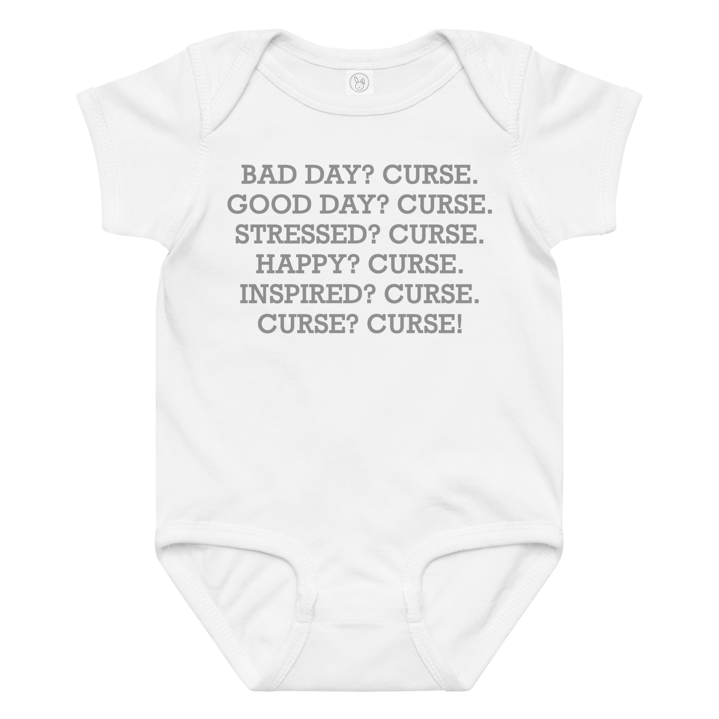 "Bad Day? Curse. Good Day? Curse. Stressed? Curse. Happy? Curse. Inspired? Curse. Curse? Curse!" printed on a white baby jersey bodysuit laying on a flat surface amongst other clothes