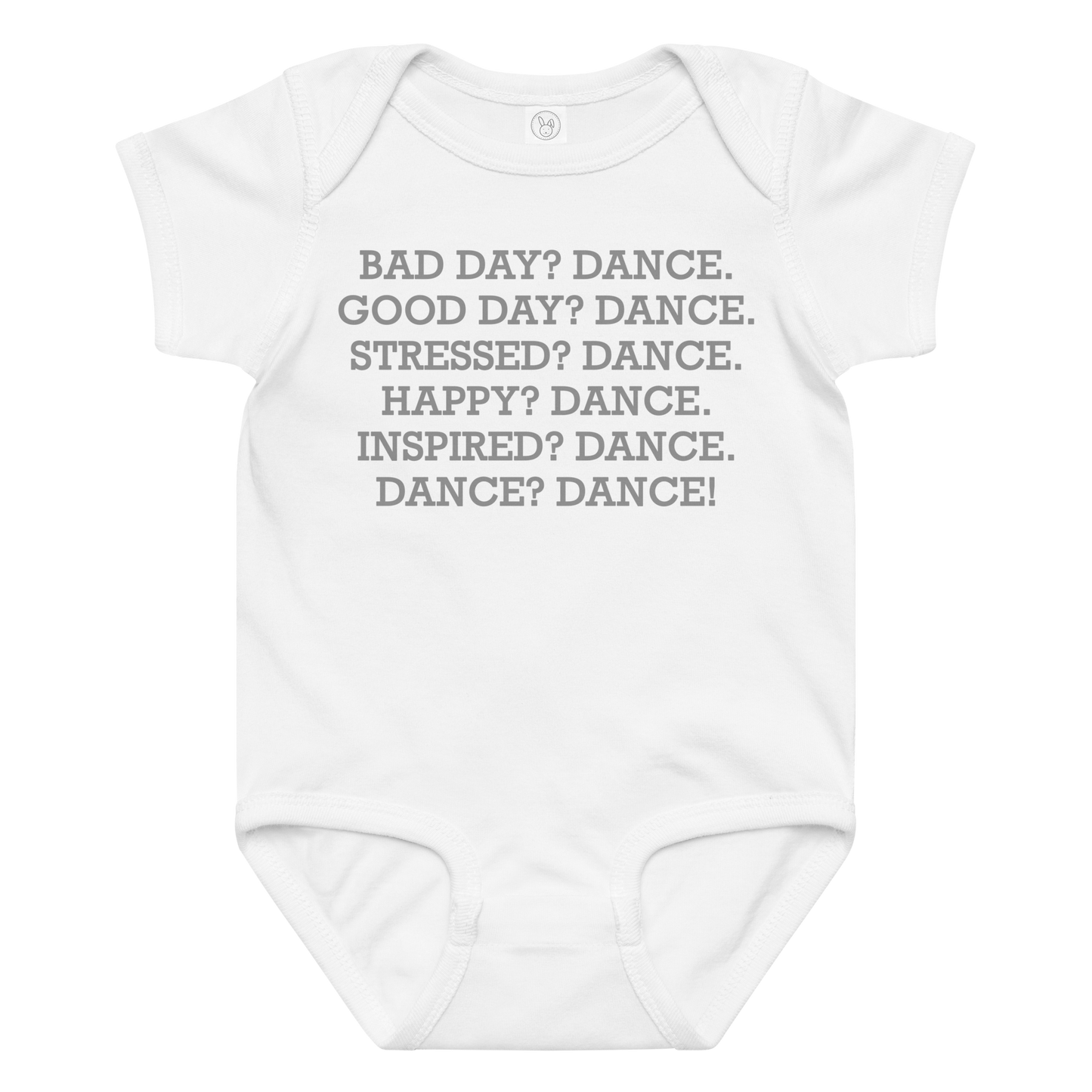 "Bad Day? Dance. Good Day? Dance. Stressed? Dance. Happy? Dance. Inspired? Dance. Dance? Dance!" printed on a white baby jersey bodysuit laying on a flat surface amongst other clothes