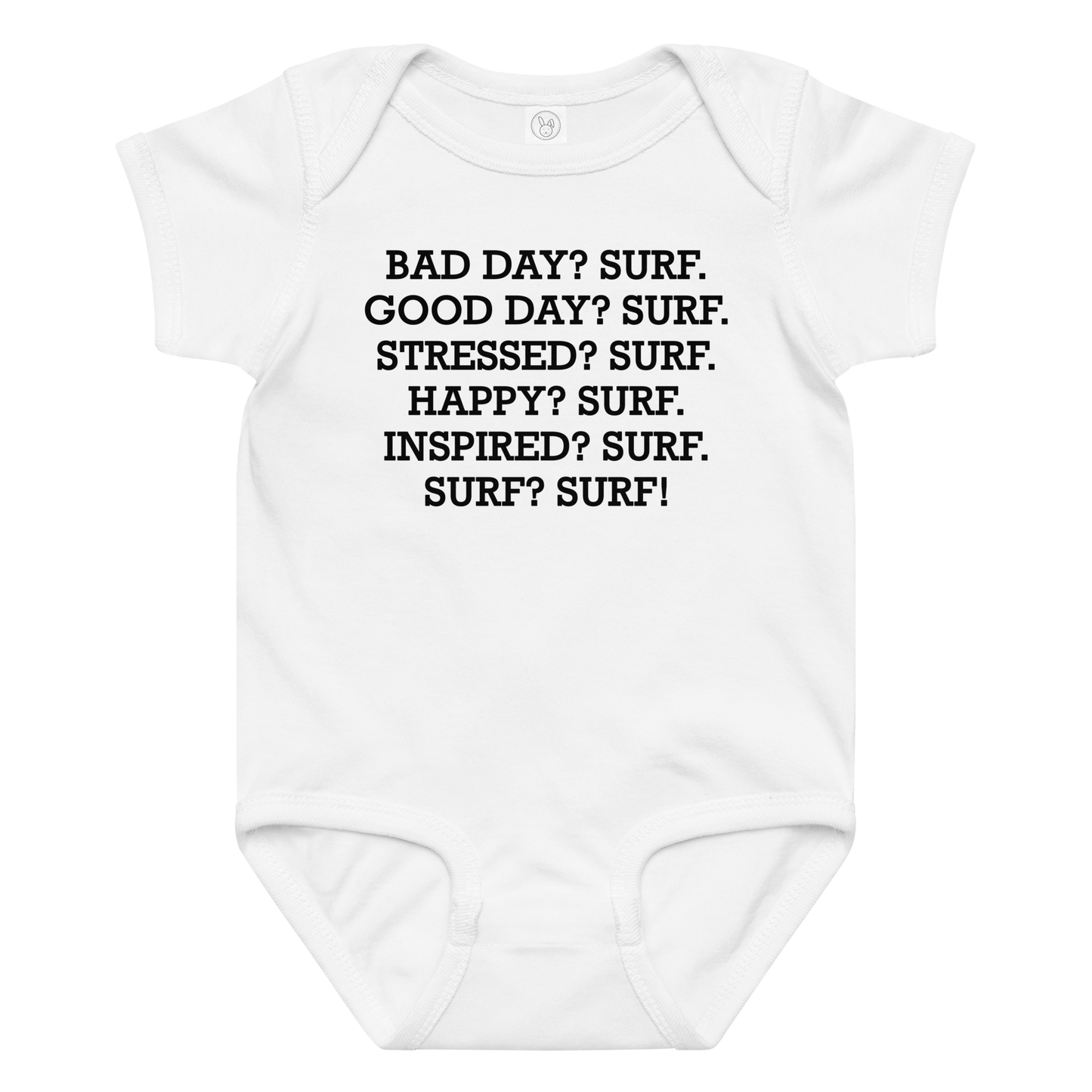 "Bad Day? Surf. Good Day? Surf. Stressed? Surf. Happy? Surf. Inspired? Surf. Surf? Surf!" printed on a white baby jersey bodysuit laying on a flat surface amongst other clothes