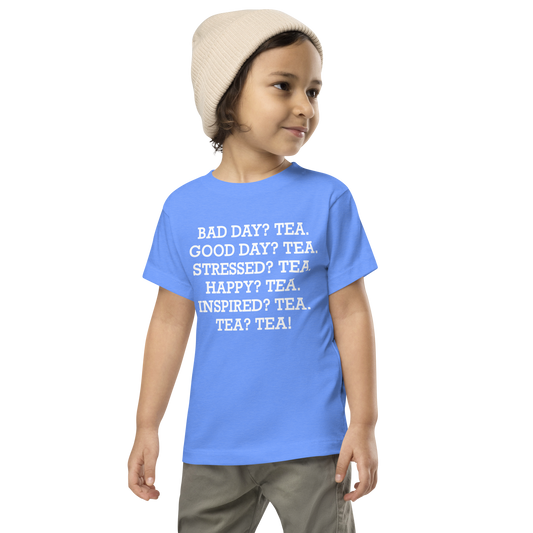 "Bad Day? Tea. Good Day? Tea. Stressed? Tea. Happy? Tea. Inspired? Tea. Tea? Tea!" printed on a heather columbia blue toddler short sleeve tee worn by a male wearing a cap