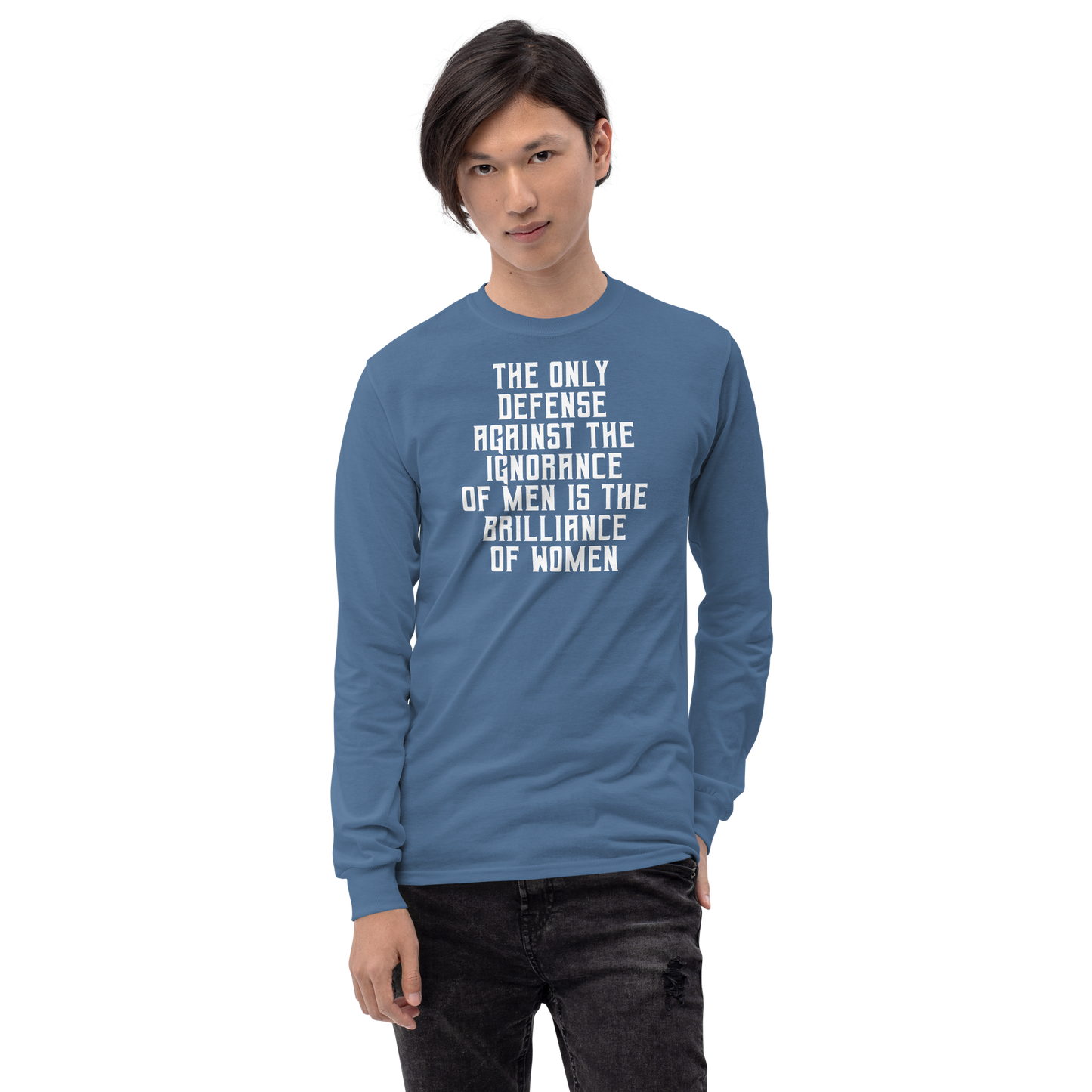 "The Only defense against the ignorance of men is the brilliance of women" printed on a indigo blue men's long sleeve shirt worn by a male