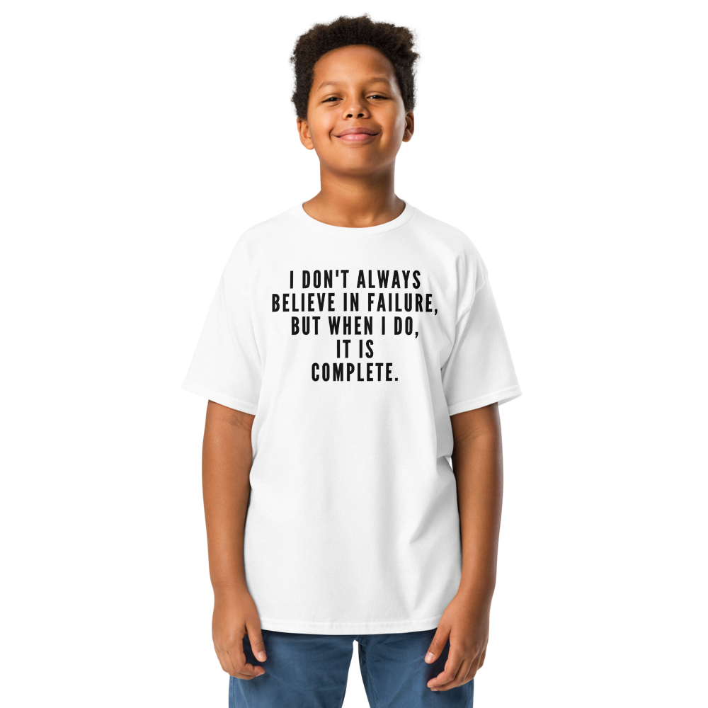 "I don't always believe in failure, but when I do, it is complete." printed on a white youth classic tee worn by a male