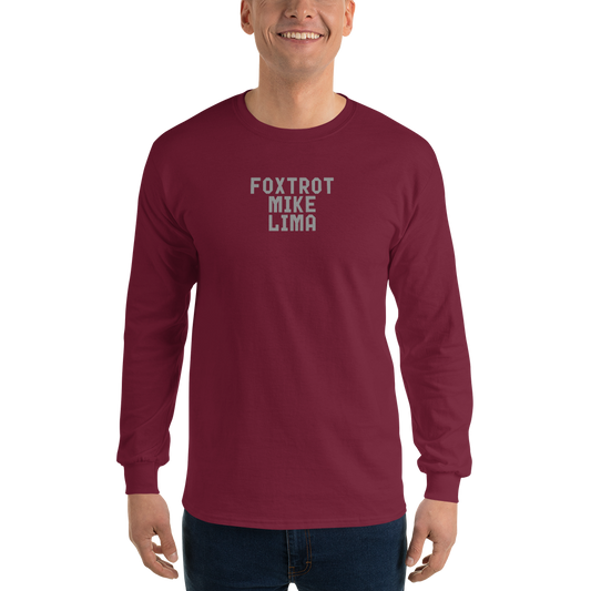 "Foxtrot Mike Lima" printed on a maroon men's long sleeve shirt worn by a male