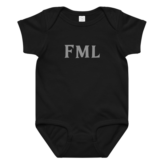 "FML" printed on a black baby jersey bodysuit laying on a flat surface amongst other clothes
