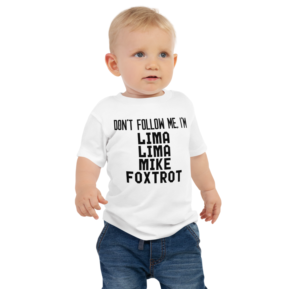 "Don’t follow me, I'm Lima Lima Mike Foxtrot" printed on a white baby jersey short sleeve tee worn by a male