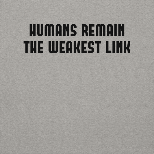 "Humans remain the weakest link" printed on a carbon grey background