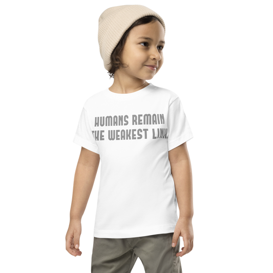 "Humans remain the weakest link" printed on a white toddler short sleeve tee worn by a male wearing a cap