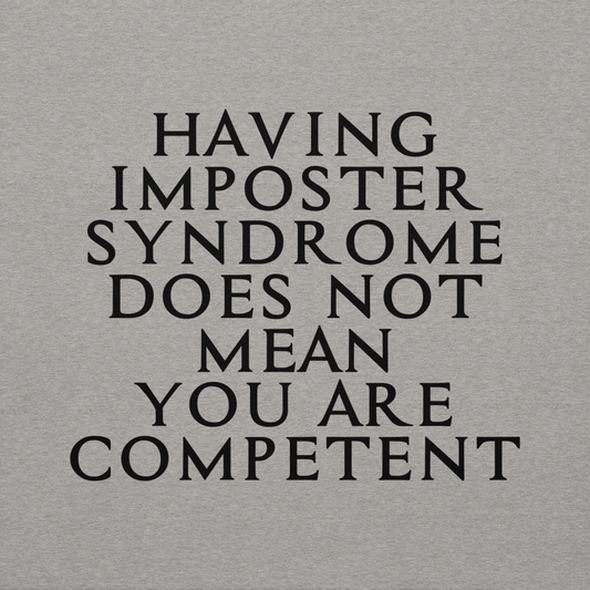 "Having Imposter Syndrome does not mean you are competent" printed on a carbon grey background