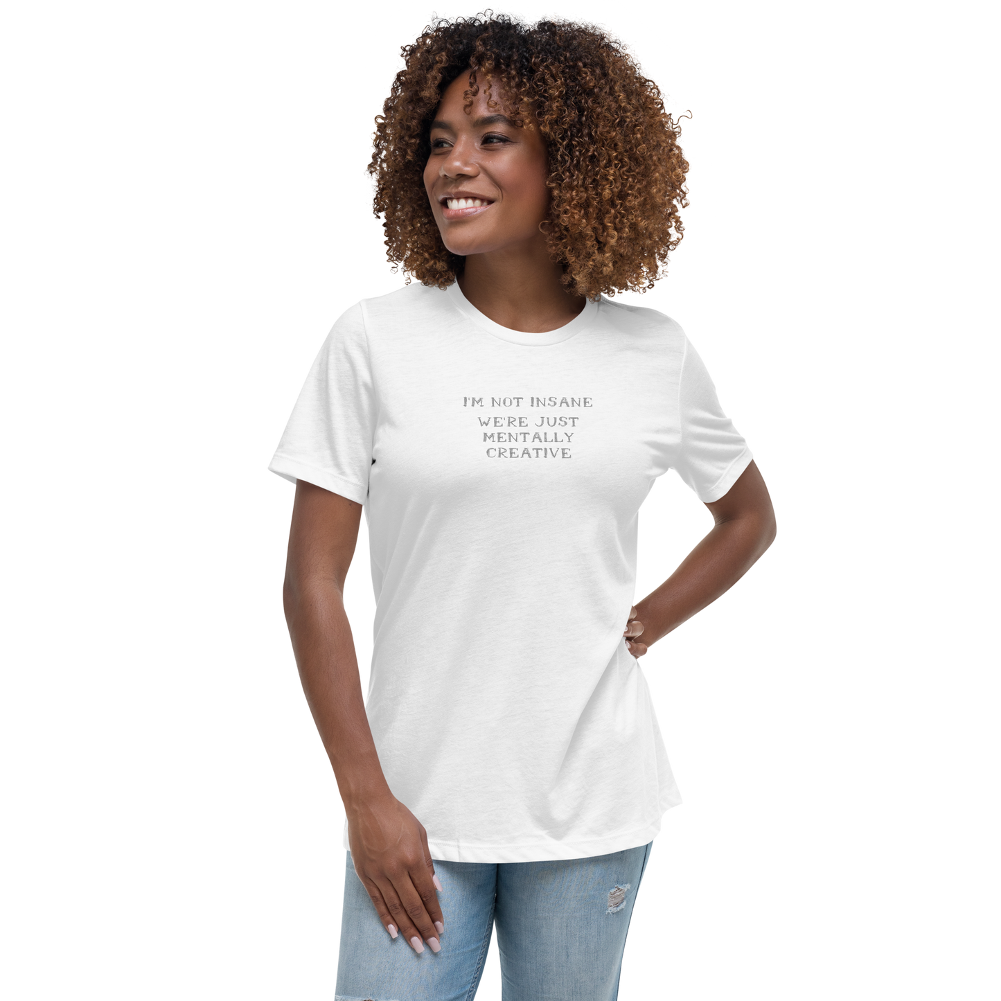 "I’m not insane We’re just mentally creative" printed on a white women's relaxed t-shirt worn by a female