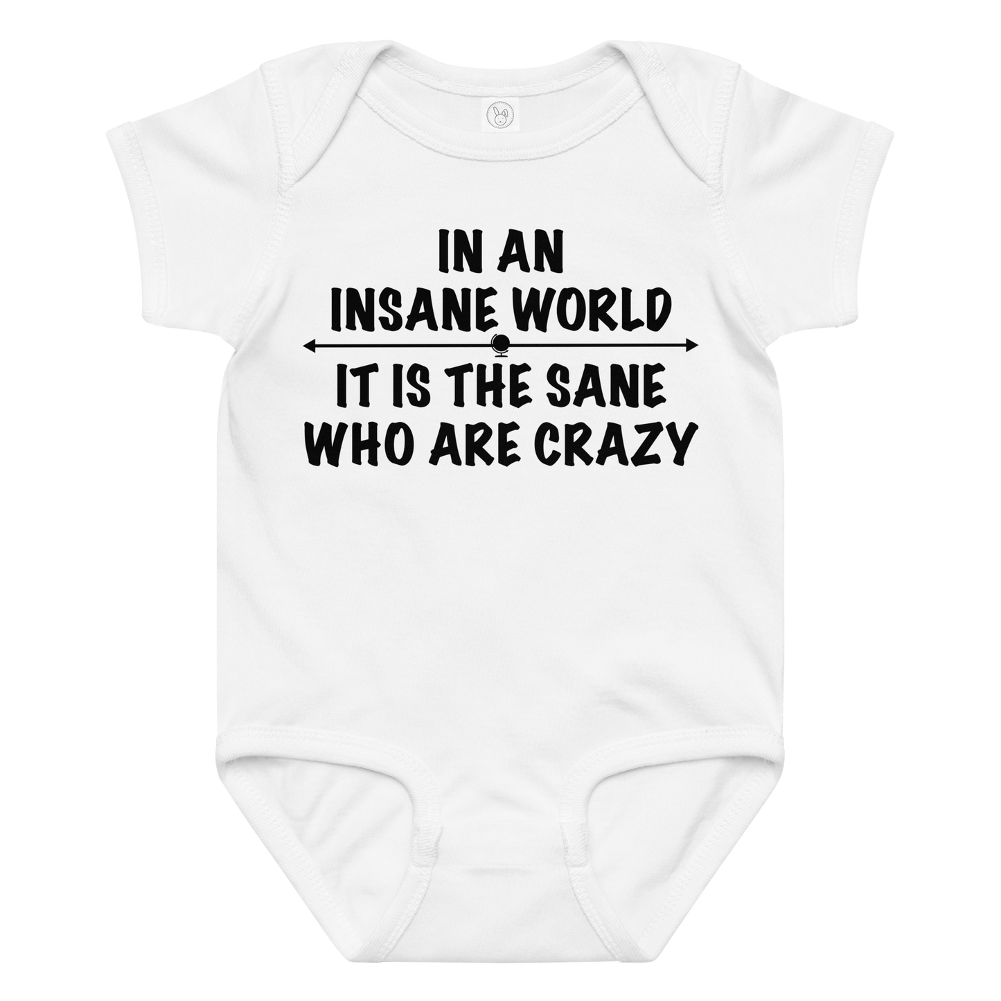 "In an insane world, it is the sane who are crazy" printed on a white baby jersey bodysuit laying on a flat surface amongst other clothes