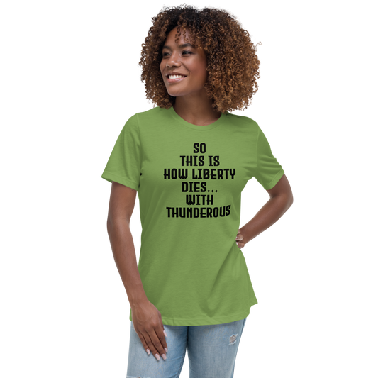 "So this is how liberty dies… with thunderous applause" printed on a leaf women's relaxed t-shirt worn by a female