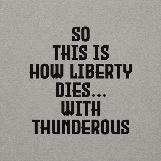 "So this is how liberty dies… with thunderous applause" printed on a carbon grey background