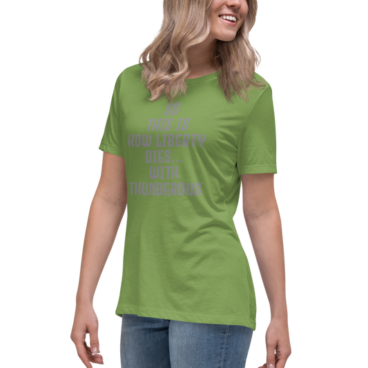 "So this is how liberty dies… with thunderous applause" printed on a leaf women's relaxed t-shirt worn by a female