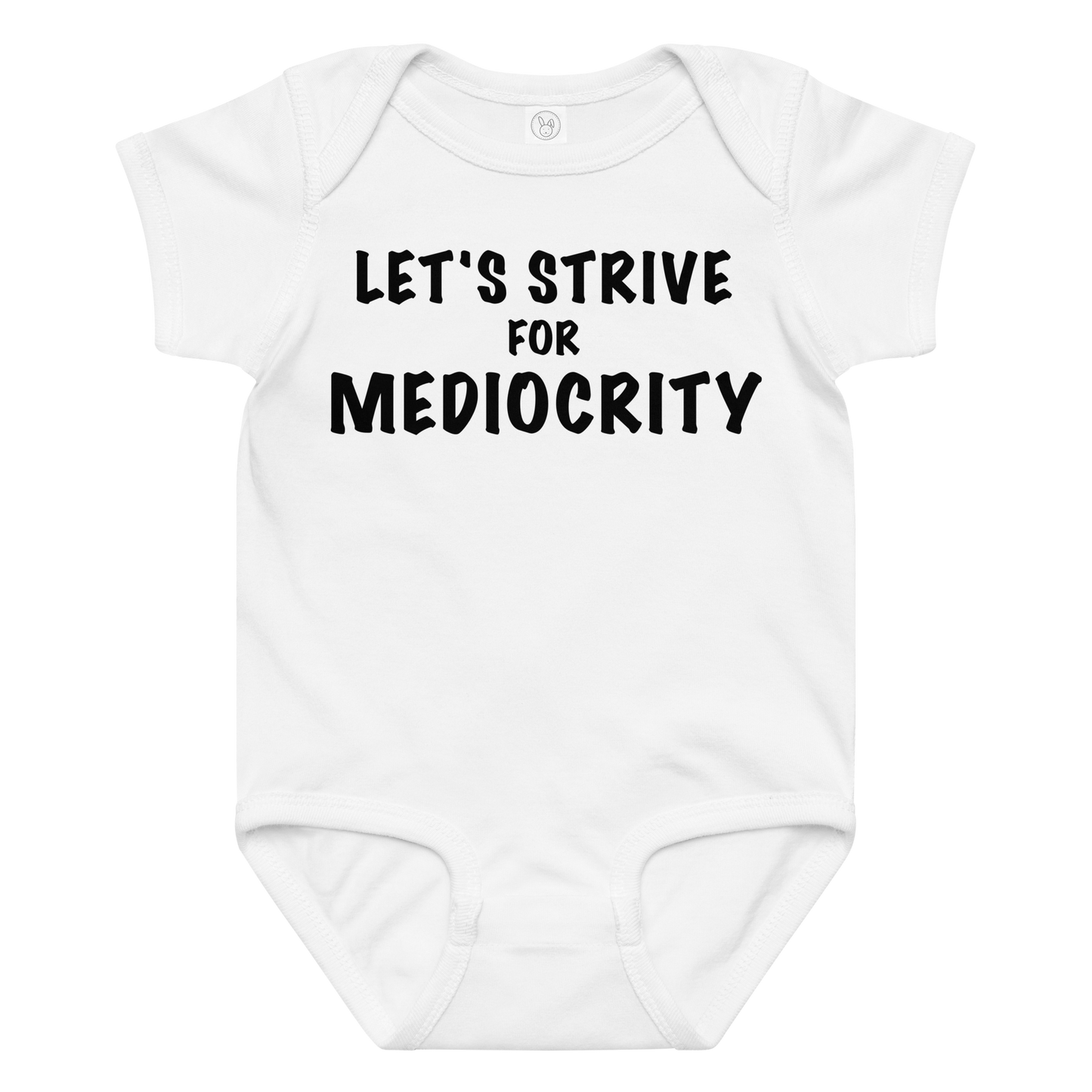 "Let's strive for mediocity" printed on a white baby jersey bodysuit laying on a flat surface amongst other clothes