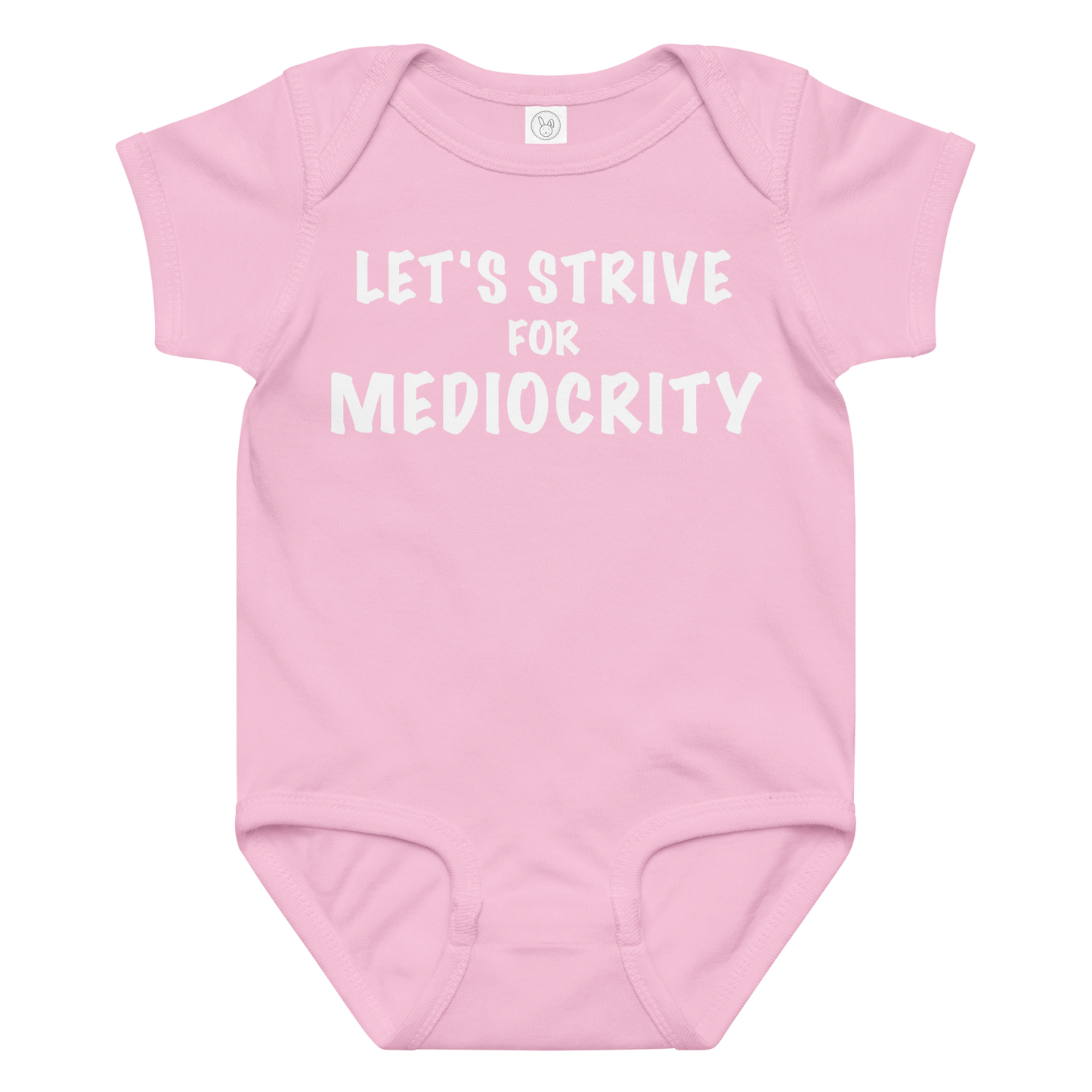 "Let's strive for mediocity" printed on a pink baby jersey bodysuit laying on a flat surface amongst other clothes