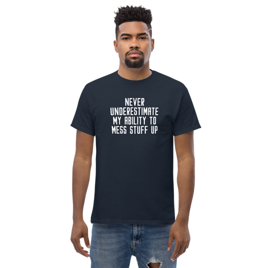 "Never Understimate My Ability To Mess Stuff Up" printed on a navy unisex classic tee worn by a male
