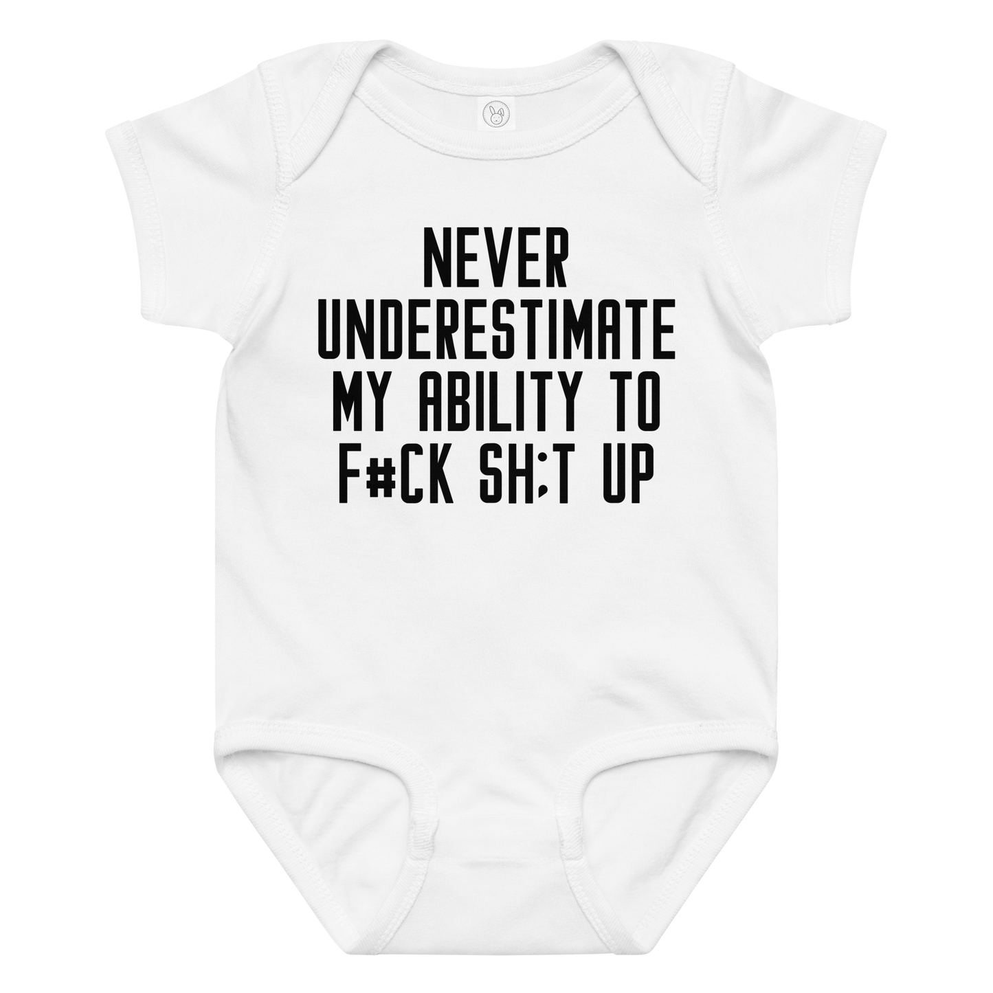 "Never Understimate My Ability To F#Ck Sh:t Up" printed on a white baby jersey bodysuit laying on a flat surface amongst other clothes