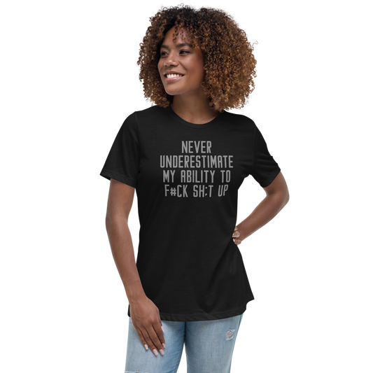 "Never Understimate My Ability To F#Ck Sh:t Up" printed on a black women's relaxed t-shirt worn by a female