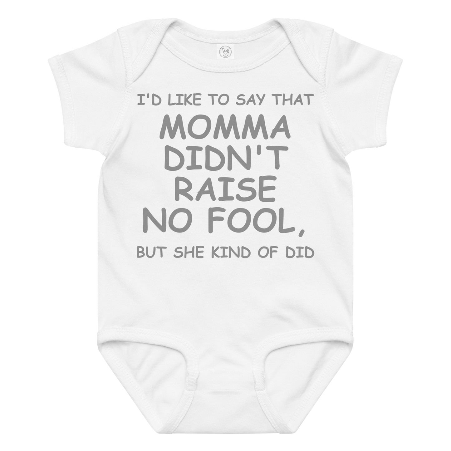 "I'd like to say that momma didn't raise no fool, but she kind of did" printed on a white baby jersey bodysuit laying on a flat surface amongst other clothes