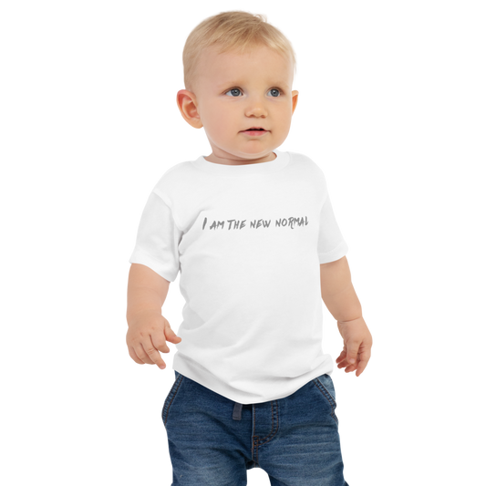 "I am the new normal" printed on a white baby jersey short sleeve tee worn by a male