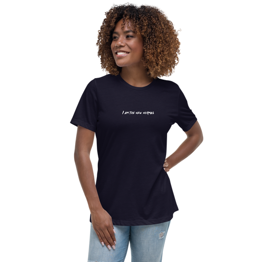 "I am the new normal" printed on a navy women's relaxed t-shirt worn by a female