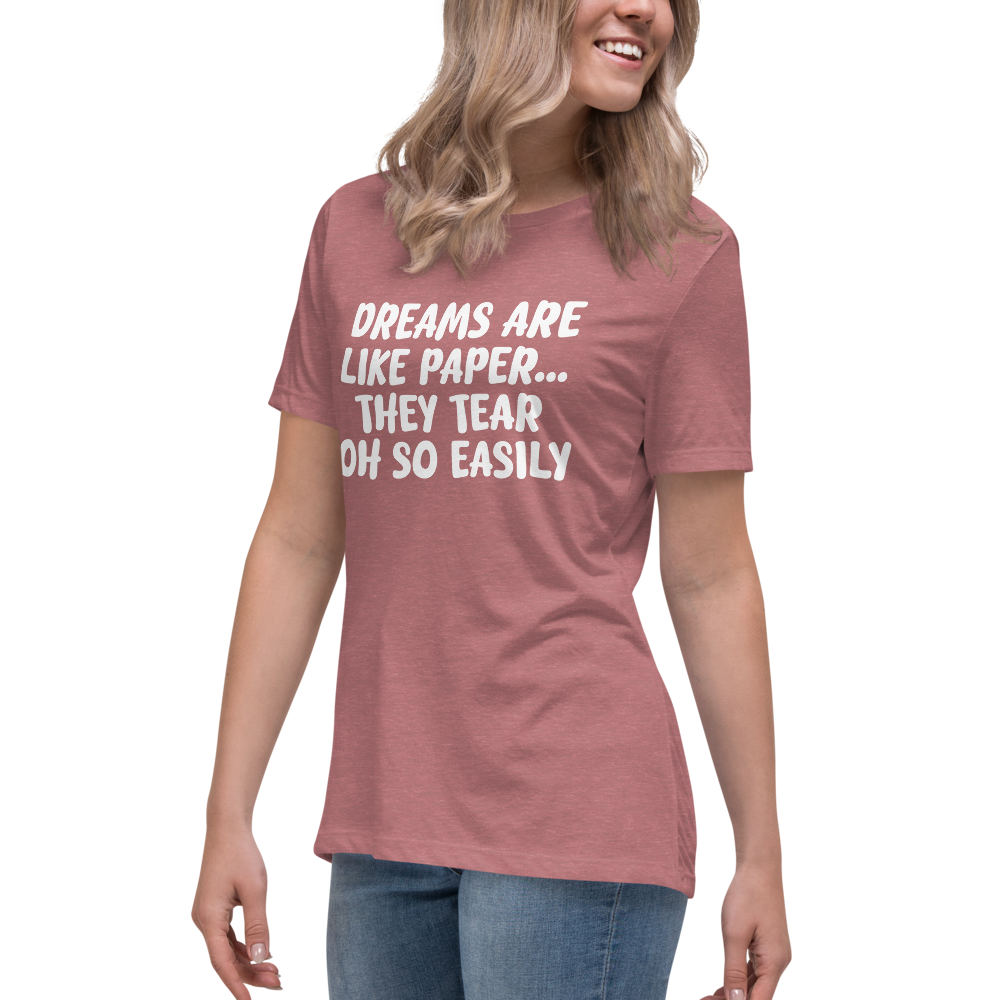 "Dreams are like paper, they tear oh so easily" printed on a heather mauve women's relaxed t-shirt worn by a female