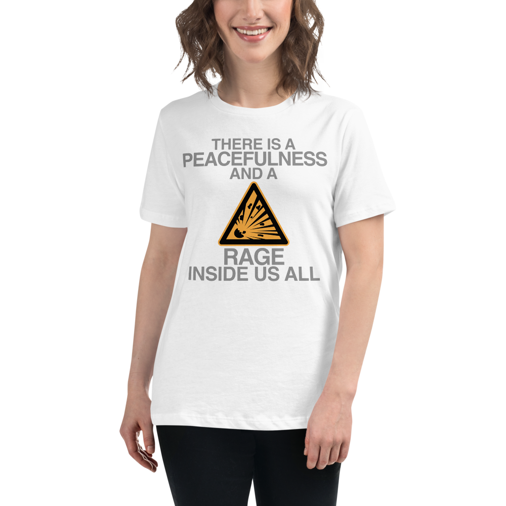 "There is a peacefulness and a rage inside us all" printed on a white women's relaxed t-shirt worn by a female